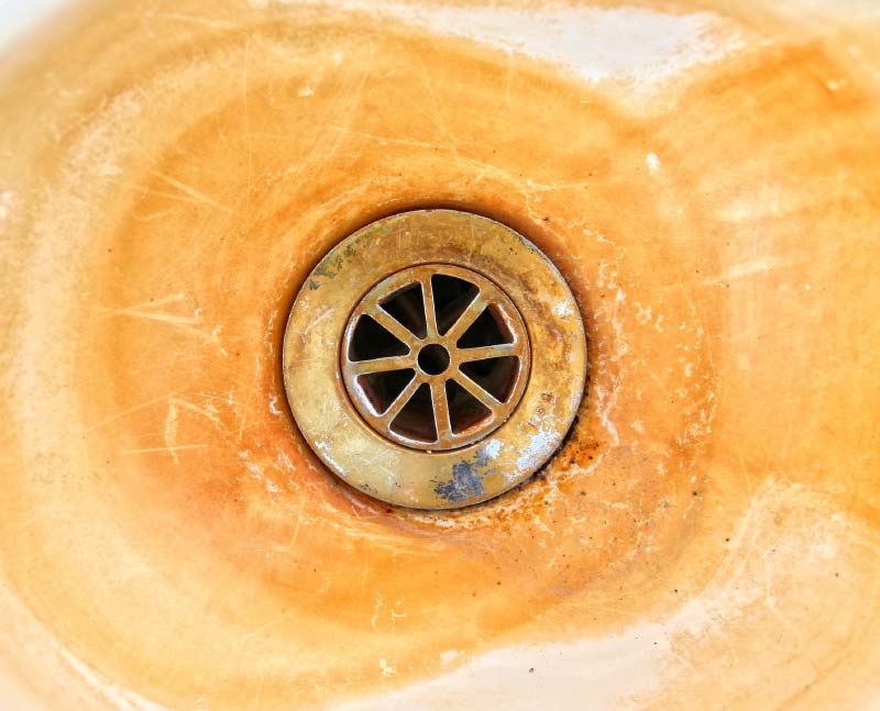 Drain with stains from well water